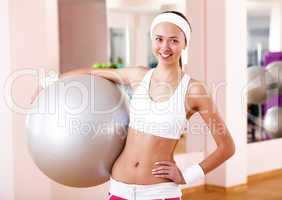 Young woman doing sport in gym