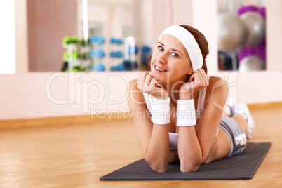 Young woman doing sport in gym