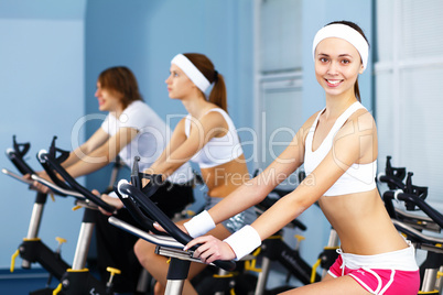 Young woman doing sport in gym