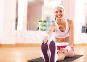 Young woman doing sport in gym