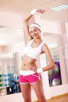 Young woman doing sport in gym