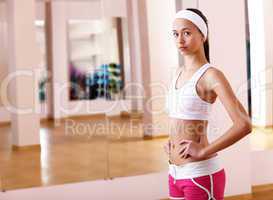 Young woman doing sport in gym