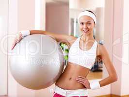 Young woman doing sport in gym