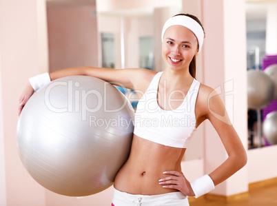 Young woman doing sport in gym