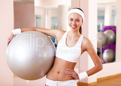 Young woman doing sport in gym