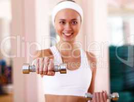 Young woman doing sport in gym