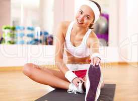 Young woman doing sport in gym