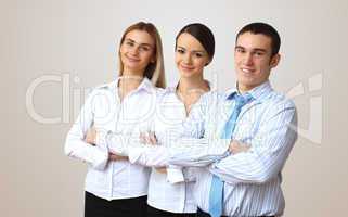 three successful young business persons together