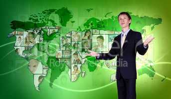 Young man against world map background