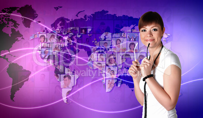 Young woman against world map background