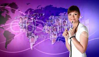 Young woman against world map background