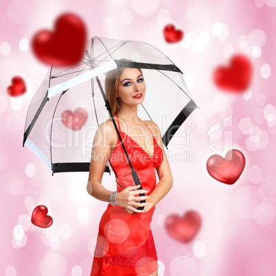 Pretty young woman with umbrella and hearts