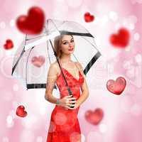 Pretty young woman with umbrella and hearts