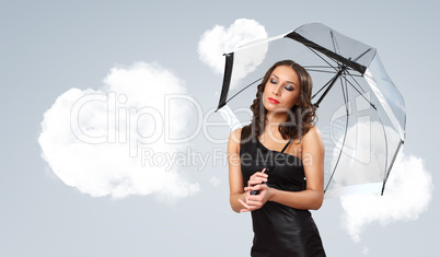 Pretty young woman with umbrella and hearts