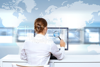 Businesswoman working with virtual digital screens