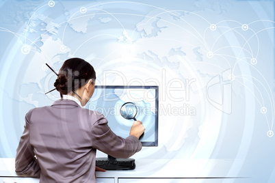 Businesswoman working with virtual digital screens