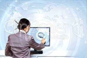 Businesswoman working with virtual digital screens