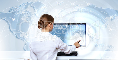 Businesswoman working with virtual digital screens