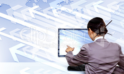 Businesswoman working with virtual digital screens