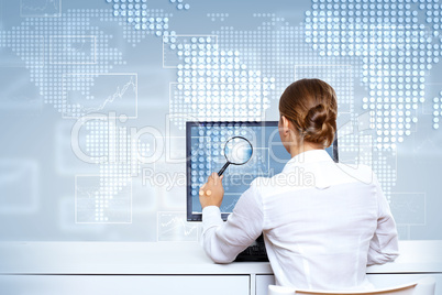 Businesswoman working with virtual digital screens