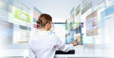 Businesswoman working with virtual digital screens