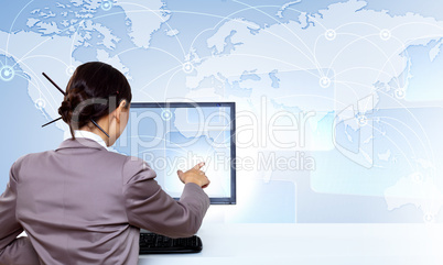 Businesswoman working with virtual digital screens