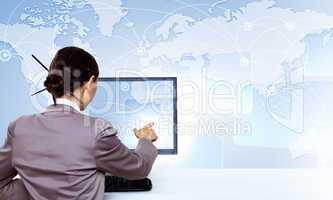 Businesswoman working with virtual digital screens