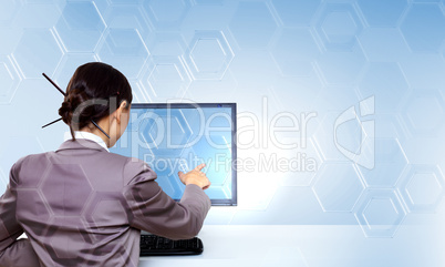 Businesswoman working with virtual digital screens