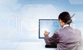 Businesswoman working with virtual digital screens