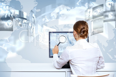 Businesswoman working with virtual digital screens