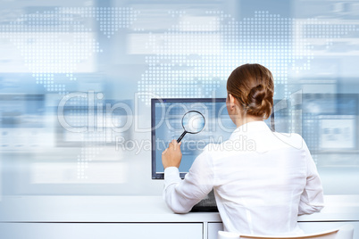 Businesswoman working with virtual digital screens