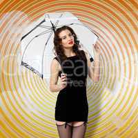 Woman dressed in retro style with umbrella