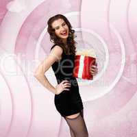 Woman in black dress with a gift box