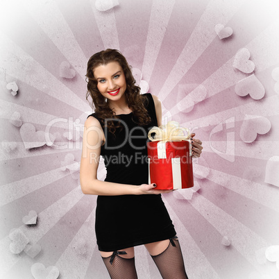 Woman in black dress with a gift box