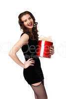 Woman in black dress with a gift box