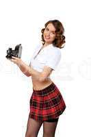 Woman dressed in retro style with camera