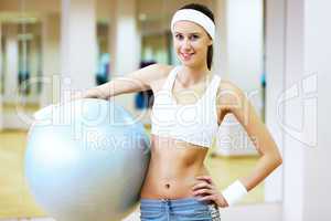 Woman in sport wear doing sport in gym