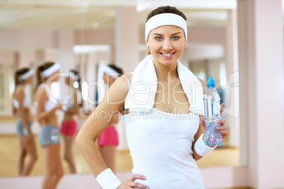 Woman in sport wear doing sport in gym