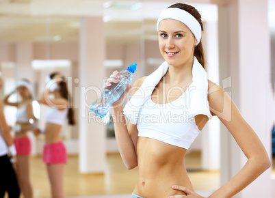 Woman in sport wear doing sport in gym