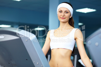 Woman in sport wear doing sport in gym