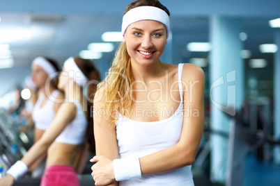 Woman in sport wear doing sport in gym