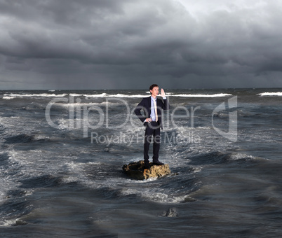 Businessman surfing on the sea waves