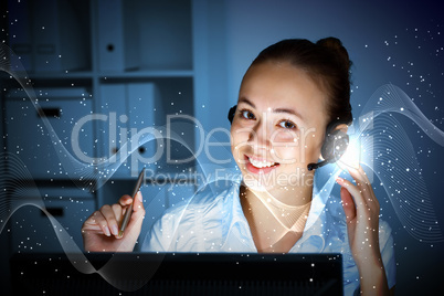Young woman in business wear and headset Young woman in business wear and headset