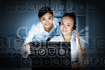 Young woman in business wear and headset