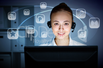 Young woman in business wear and headset