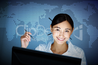 Young woman in business wear and headset