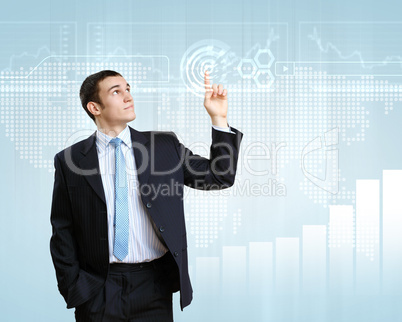 Businessman against technology background