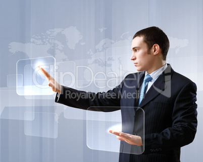 Businessman against technology background