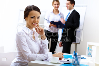 Portrait of a business woman in office Portrait of a business woman in office