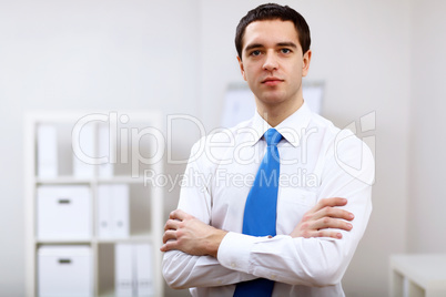 Young businessman at work in office